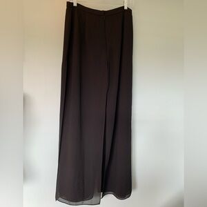 Metaphor black pants with chiffon panels over front and back. Size medium.